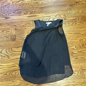 BCBGeneration sheer black tank with leather like detail on shoulders